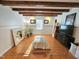 Bright bonus room with hardwood floors, exposed beams, and large mirror at 4909 Old Elizabeth Rd. Rd, Raleigh, NC 27616