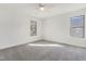 Bright bedroom with neutral carpeting and ample natural light at 502 Randolph Dr, Clayton, NC 27520