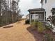 Landscaped backyard with screened porch and privacy at 5112 N River Sand Trl, Raleigh, NC 27604