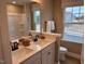 Double vanity bathroom with tub and shower at 5112 N River Sand Trl, Raleigh, NC 27604
