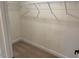 Large walk-in closet with wire shelving at 5112 N River Sand Trl, Raleigh, NC 27604