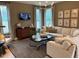 Spacious living room with large sectional sofa at 5112 N River Sand Trl, Raleigh, NC 27604