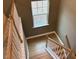 Upstairs view of staircase and landing at 5112 N River Sand Trl, Raleigh, NC 27604