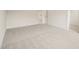 Bedroom with carpet flooring and open doorway at 92 Frost Meadow Way, Lillington, NC 27546