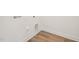 A dedicated laundry room with hookups and hardwood-style flooring at 92 Frost Meadow Way, Lillington, NC 27546