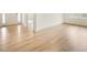 Expansive living room featuring hardwood floors, creating a warm and inviting space at 92 Frost Meadow Way, Lillington, NC 27546