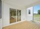Covered porch with wood floors and railings at 92 Frost Meadow Way, Lillington, NC 27546