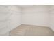 A walk-in closet with carpet and shelving at 92 Frost Meadow Way, Lillington, NC 27546