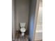 Simple bathroom with toilet and vinyl flooring at 1039 Branch Chapel Church Rd, Selma, NC 27576