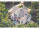 Bird's-eye view of house, pool, and landscaping at 11201 Jonas Ridge Ln, Raleigh, NC 27613