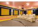 State-of-the-art home theater with reclining seats and projector at 11201 Jonas Ridge Ln, Raleigh, NC 27613
