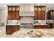 Kitchen with stainless steel appliances and granite countertops at 11201 Jonas Ridge Ln, Raleigh, NC 27613