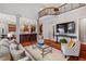 Two-story living room with hardwood floors and kitchen views at 11201 Jonas Ridge Ln, Raleigh, NC 27613