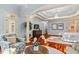 Main bedroom with sitting area and hardwood floors at 11201 Jonas Ridge Ln, Raleigh, NC 27613