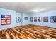 Spacious room with decorative hardwood floor at 11201 Jonas Ridge Ln, Raleigh, NC 27613