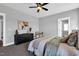 Comfortable bedroom featuring neutral tones, plush carpeting, and abundant natural light at 1178 Sheriff Johnson Rd, Lillington, NC 27546