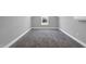 Spacious bonus room filled with natural light featuring carpet flooring and gray walls at 1178 Sheriff Johnson Rd, Lillington, NC 27546