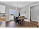 Open dining area with abundant natural light and views of the outdoors creates a welcoming space at 1178 Sheriff Johnson Rd, Lillington, NC 27546
