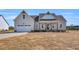 Charming home exterior with well-designed architectural elements and a spacious two-car garage at 1178 Sheriff Johnson Rd, Lillington, NC 27546