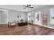 Bright living room with a ceiling fan and plenty of natural light at 1178 Sheriff Johnson Rd, Lillington, NC 27546