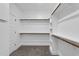 Bright walk-in closet featuring custom shelving and plenty of hanging space at 1178 Sheriff Johnson Rd, Lillington, NC 27546