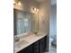Bathroom with double sink vanity and shower at 135 Jones Creek Ln Ln, Lillington, NC 27546
