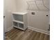 Practical laundry room with built-in shelving and ample space for appliances at 135 Jones Creek Ln Ln, Lillington, NC 27546