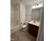 Clean bathroom with single vanity and tile flooring at 166 Easy Wind Ln, Garner, NC 27529
