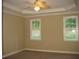 Spacious bedroom with neutral walls, ceiling fan, and carpet flooring at 166 Easy Wind Ln, Garner, NC 27529