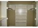 Walk-in closet with ample shelving and hanging space at 166 Easy Wind Ln, Garner, NC 27529