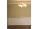 Formal dining room with hardwood floors and wainscoting at 166 Easy Wind Ln, Garner, NC 27529