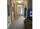 Bright entryway with hardwood floors and view to the living room at 166 Easy Wind Ln, Garner, NC 27529