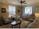 Spacious living room with a view into the kitchen and sunroom at 166 Easy Wind Ln, Garner, NC 27529