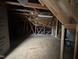 Unfinished attic space offering great storage potential at 166 Easy Wind Ln, Garner, NC 27529