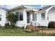 Front view of a charming white house at 1805 Brown Ave, Burlington, NC 27215