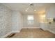 Laundry room with tile floor and built-in cabinets at 1805 Brown Ave, Burlington, NC 27215