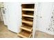 Kitchen pantry with five pull-out drawers offers ample storage at 1805 Brown Ave, Burlington, NC 27215