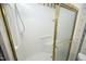 Walk-in shower with tiled walls and seat at 1805 Brown Ave, Burlington, NC 27215