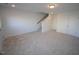 Spacious unfinished basement with carpeted floors and ample storage at 1924 Robin Hill Ln, Raleigh, NC 27610