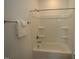 Clean bathroom with a tub shower combo and built in shelving at 1924 Robin Hill Ln, Raleigh, NC 27610