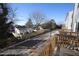 View from deck showcasing neighborhood and tree-lined street at 1924 Robin Hill Ln, Raleigh, NC 27610