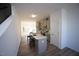 Open concept kitchen with gray cabinets and island at 1924 Robin Hill Ln, Raleigh, NC 27610
