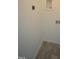 Convenient laundry area with tile floor and built-in shelving at 1924 Robin Hill Ln, Raleigh, NC 27610