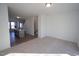 Open living room with view into kitchen and stairs at 1924 Robin Hill Ln, Raleigh, NC 27610