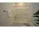 Clean bathroom with a shower/tub combo and updated fixtures at 1928 Robin Hill Ln, Raleigh, NC 27610