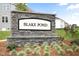Elegant stone entrance sign for the 'Blake Pond' community at 23 Frost Meadow Way, Lillington, NC 27546