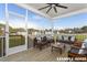 Relaxing screened patio with comfortable seating, ideal for enjoying the outdoors at 23 Frost Meadow Way, Lillington, NC 27546