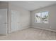 Simple bedroom with neutral walls and carpet at 2923 Logan Valley Path, Apex, NC 27502