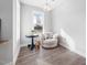 Sitting room with a modern chair and a round table at 313 E Fourth St, Wendell, NC 27591