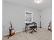 Bedroom with carpet flooring and musical instruments at 402 Sparella St, Durham, NC 27703